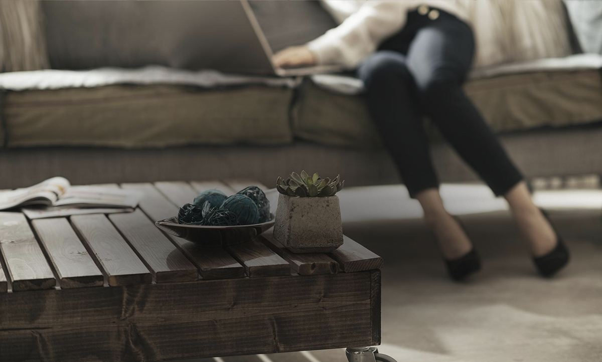 Woman Legs Crossed on Couch